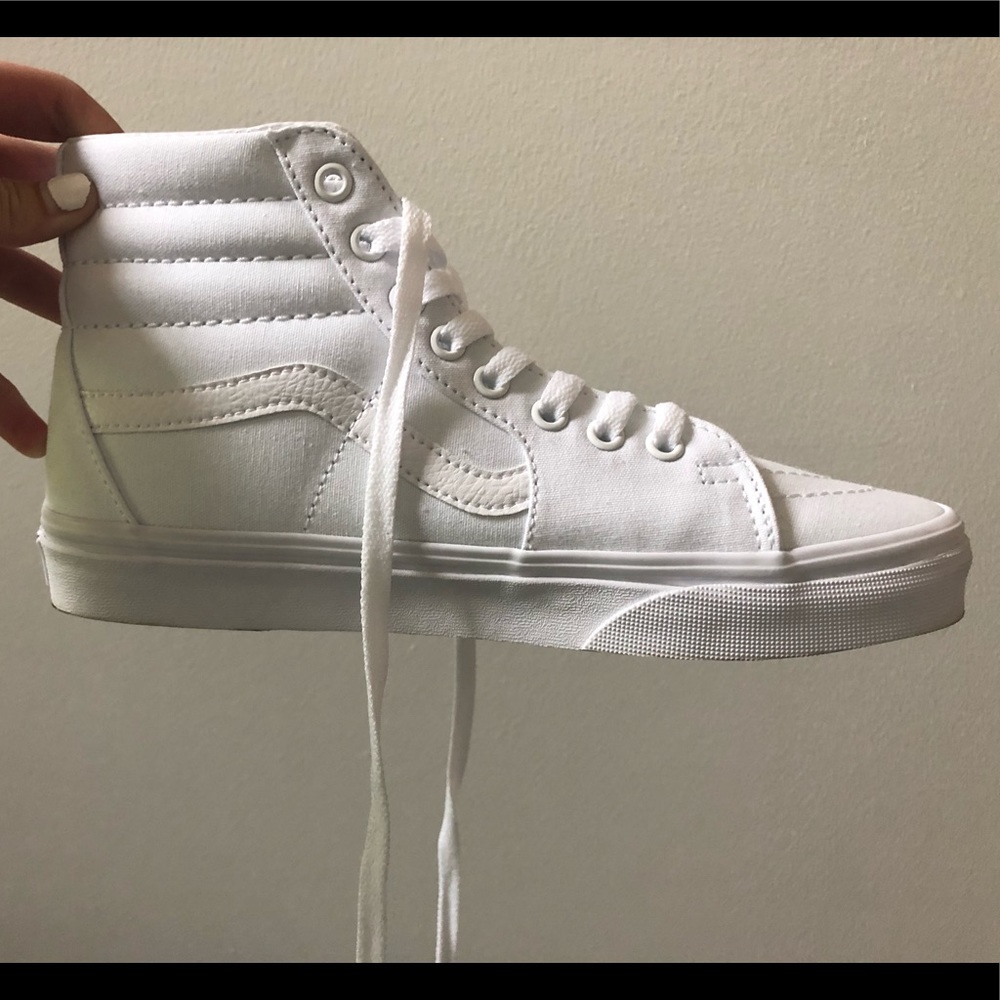 Brand new high top white vans. Woman’s size 8